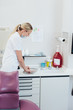 © contrastwerkstatt - Dental nurse preparing instruments in the surgery