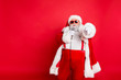 © deagreez - Portrait of fat overweight real pop star hipster santa claus with big abdomen broadcast sing songs wear style stylish trendy eyewear eyeglasses hat headwear isolated over yellow background