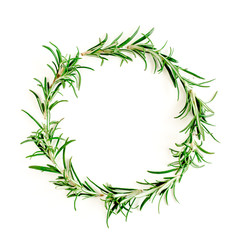  Round wreath frame made herbs, green branches, leaves rosemary. Flat lay. Top view.