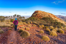 Woman Hiking On Mt Sonder Track, West MacDonnell National Park, Northern Territory, Australia