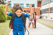© Louis-Photo - A student school girl on the playground on the first day of class