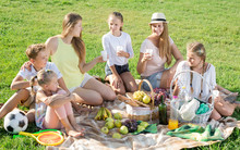 Portrait Of Young Women With Children On Picnic