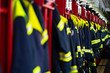 Firefighter suits and helmets at fire station