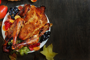 Poster - Thanksgiving background. turkey on a dark background. view from above. copy space. Flatlay. top view