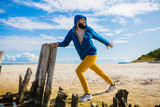 Man exercise and stretching by the sea