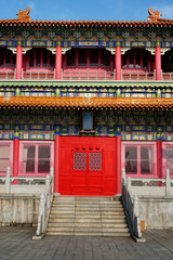 Wall Mural -  Xi Qiao Mountain Guoyi Movie and TV City, Foshan, China.  Front door of the palace in chinese traditional style.