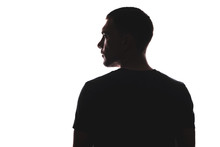 Silhouette Portrait Of Man With His Back Looking Away, Isolated On A White Background