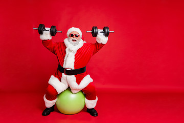 Sticker - Full length body size view of his he cheerful cheery glad funky fat overweight plump gray-haired bearded man lifting weight body building isolated over bright vivid shine red background