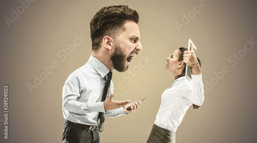 Fotografía Angry businessman screaming at employee in the office