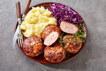 Poster - crepinette with potato mash and cabbage salad