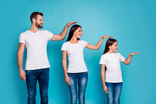 Profile Side Photo Of Sweet Parent And Their Daughter With Brunet Hair Holding Hand Looking Wearing White T-shirt Denim Jeans Isolated Over Blue Background