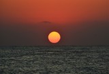 Fototapeta Zachód słońca - a beautiful sunrise at the seashore