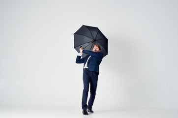 Poster - business man with umbrella