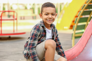 Poster - Cute little African-American boy on playground