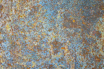 Wall Mural - Abstract grunge rustic background. Colorful rusty background. Selective focus