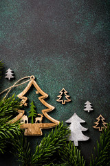 overhead shoot of wooden christmas tree and decoration. winter holidays background with copy space, 