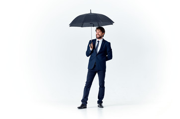 Poster - business man with an umbrella