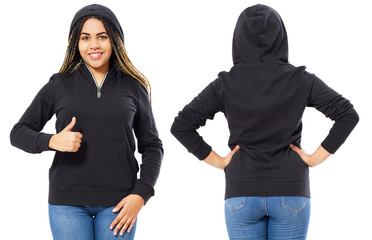 Wall Mural - Black hoodie on a young black woman in jeans, front and back, isolated, mockup. Female hoodie show like sign isolated