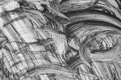 Abstract gouache paint strokes in black and white painting for backgrounds