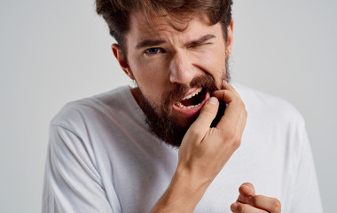 Wall Mural - young man talking on the phone