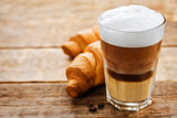 Fototapeta Mapy - Coffee drink with fresh croissants