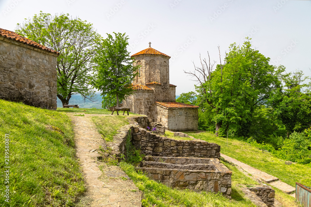 Nekresi Monastery and domed church with a tiled roof Stock Photo ...