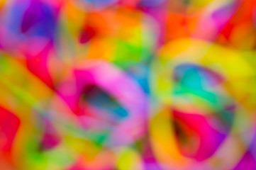 Wall Mural - Bright defocussed abstract background of jumble of rainbow colors