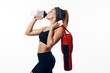 © SHOTPRIME STUDIO - woman with bottle of water isolated on white