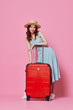 young woman with suitcase