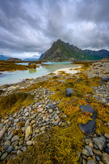 Sticker - Lofoten Islands, Northern Norway, views of the mountains and the sea on the roadside, cloudy days in summer