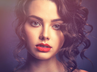 Poster - Face of a beautiful woman with a smoky eye makeup and red lipstick