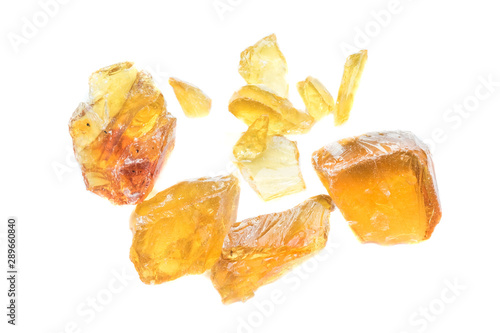 Yellow resin obtained from the rubber of the tree.