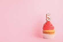 Birthday Cupcake With Number Five Candle On Pink Background, Space For Text