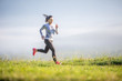 © weyo - Young sporty woman running in nature. Morning training sportswoman