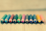 Fototapeta Tęcza - Group of colorful pencils close up. Education and arts tools