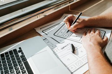 UX website design wireframe. Sketch, prototype, framework, layout future design project. UI/UX - user interface, user experience designer. Creative concept for web design studio. Website development