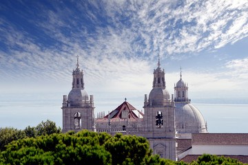 Fototapete - dome and clock towers of the late Baroque and Neo-Classical Royal Basilica and Convent of the Most Sacred Heart of Jesus, built in late 18th century in Lisbon, Portugal