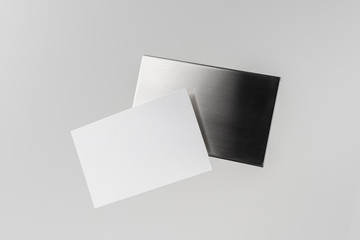 Wall Mural - top view of business card with case on white