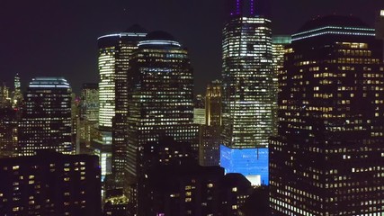 Wall Mural - Drone footage with slow rotation in front of New York City skyscrapers on September 11.