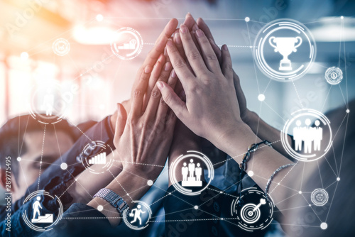 Cuadros en Lienzo Achievement and Business Goal Success Concept - Creative business people with icon graphic interface showing employee reward giving for business success achievement