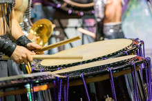 Closeup View Of Man's Hands, Drums And Drumsticks.