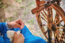 Creating Yarn Threads, Close-up. Spinning In Nature, Retro Style