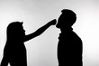 © satura_ - Aggression and abuse concept - man and woman expressing domestic violence in studio silhouette isolated on white background.