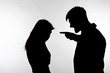 © satura_ - Aggression and abuse concept - man and woman expressing domestic violence in studio silhouette isolated on white background.