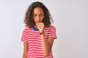 Poster - Young brazilian woman wearing red striped t-shirt standing over isolated white background feeling unwell and coughing as symptom for cold or bronchitis. Healthcare concept.