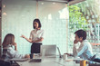 © amnaj - Young asian business group with the creative work, talk and exchange ideas shared at the meeting.