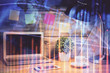 © peshkova - Double exposure of chart and financial info and work space with computer background. Concept of international online trading.