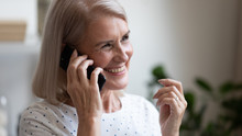 Happy Beautiful Mature Woman Making Phone Call Close Up