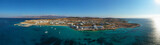 Fototapeta Desenie - Aerial drone photo of famous sandy turquoise beach of Ammos and main port of Koufonisi island, Small Cyclades, Greece