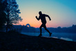 © nuclear_lily - Photo of running athlete at sunset